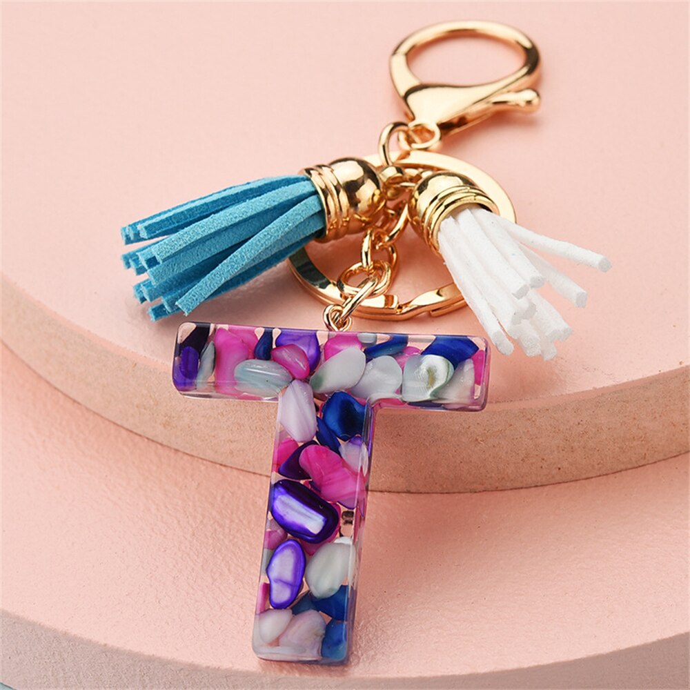 1PC Women Keychains 26 Glitter Hollowed-out Words Handbag Tassel English Letter Keyring with Puffer Ball Charms Free Shipping
