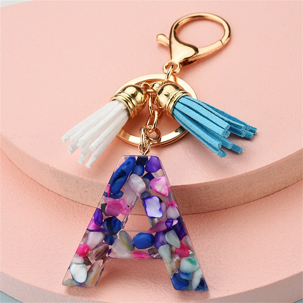 1PC Women Keychains 26 Glitter Hollowed-out Words Handbag Tassel English Letter Keyring with Puffer Ball Charms Free Shipping 1PC Women Keychains 26 Glitter Hollowed-out Words Handbag Tassel English Letter Keyring with Puffer Ball Charms Free Shipping