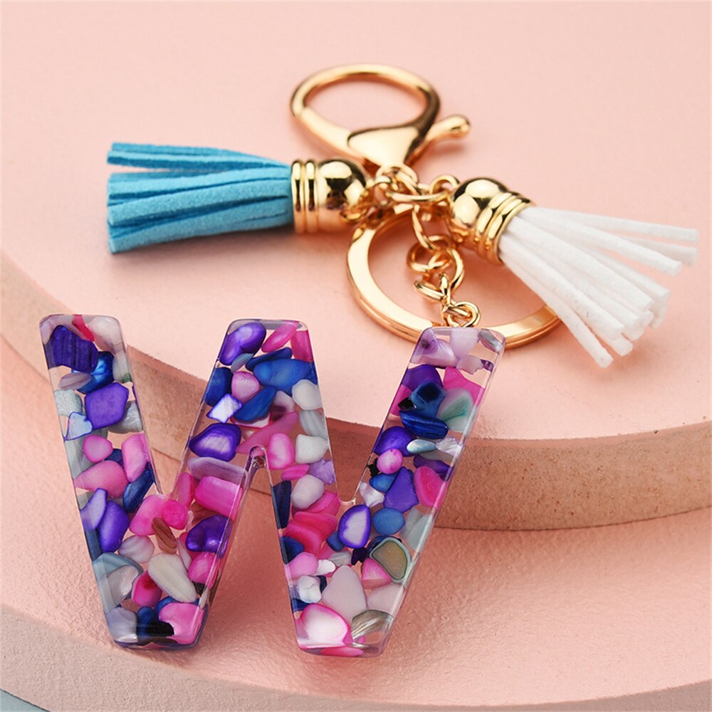 1PC Women Keychains 26 Glitter Hollowed-out Words Handbag Tassel English Letter Keyring with Puffer Ball Charms Free Shipping