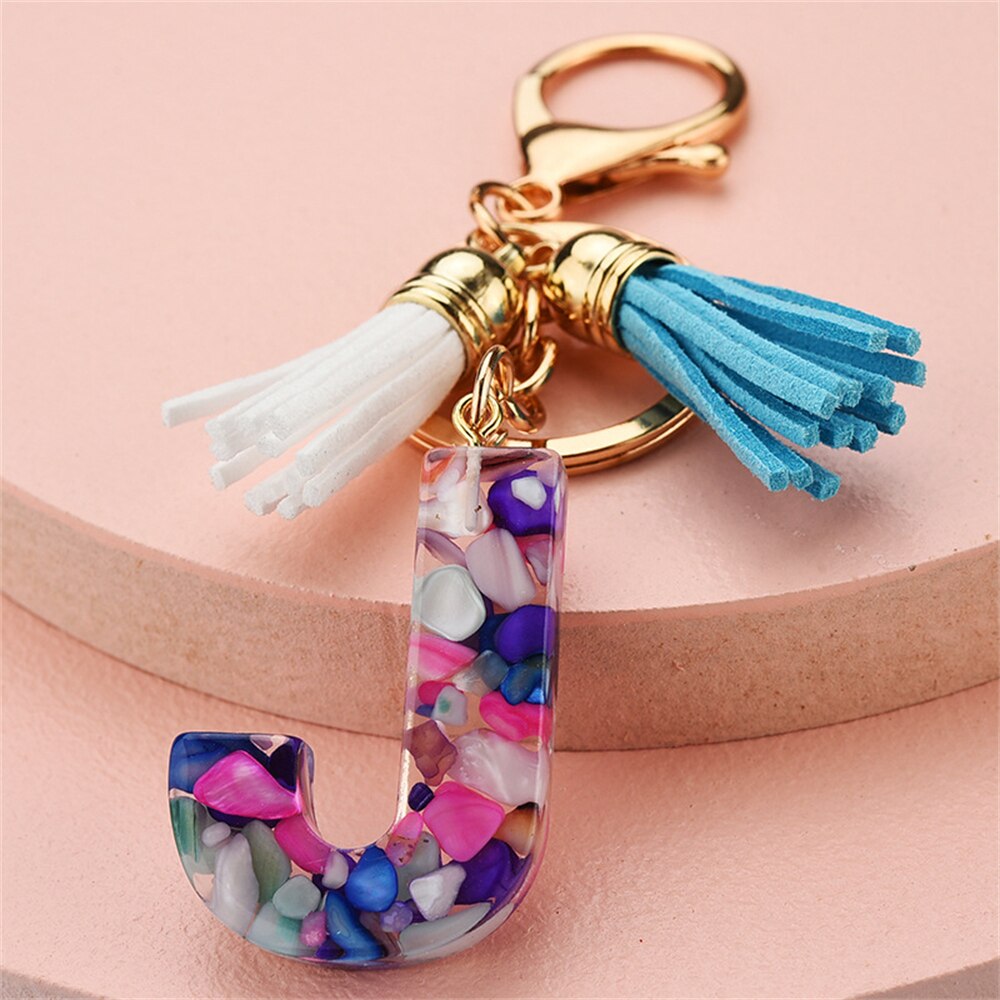 1PC Women Keychains 26 Glitter Hollowed-out Words Handbag Tassel English Letter Keyring with Puffer Ball Charms Free Shipping