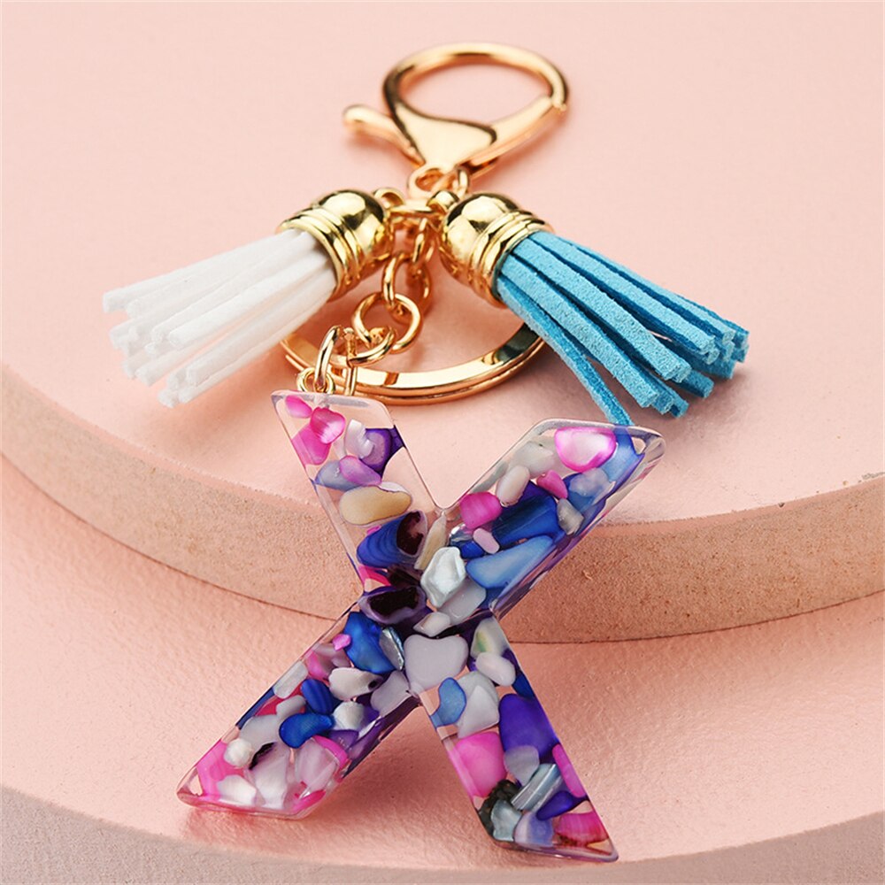 1PC Women Keychains 26 Glitter Hollowed-out Words Handbag Tassel English Letter Keyring with Puffer Ball Charms Free Shipping