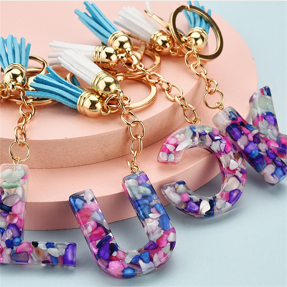 1PC Women Keychains 26 Glitter Hollowed-out Words Handbag Tassel English Letter Keyring with Puffer Ball Charms Free Shipping 1PC Women Keychains 26 Glitter Hollowed-out Words Handbag Tassel English Letter Keyring with Puffer Ball Charms Free Shipping