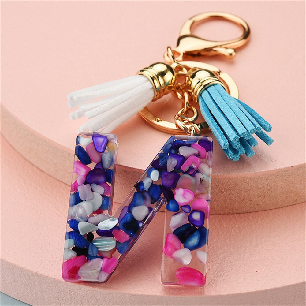 1PC Women Keychains 26 Glitter Hollowed-out Words Handbag Tassel English Letter Keyring with Puffer Ball Charms Free Shipping