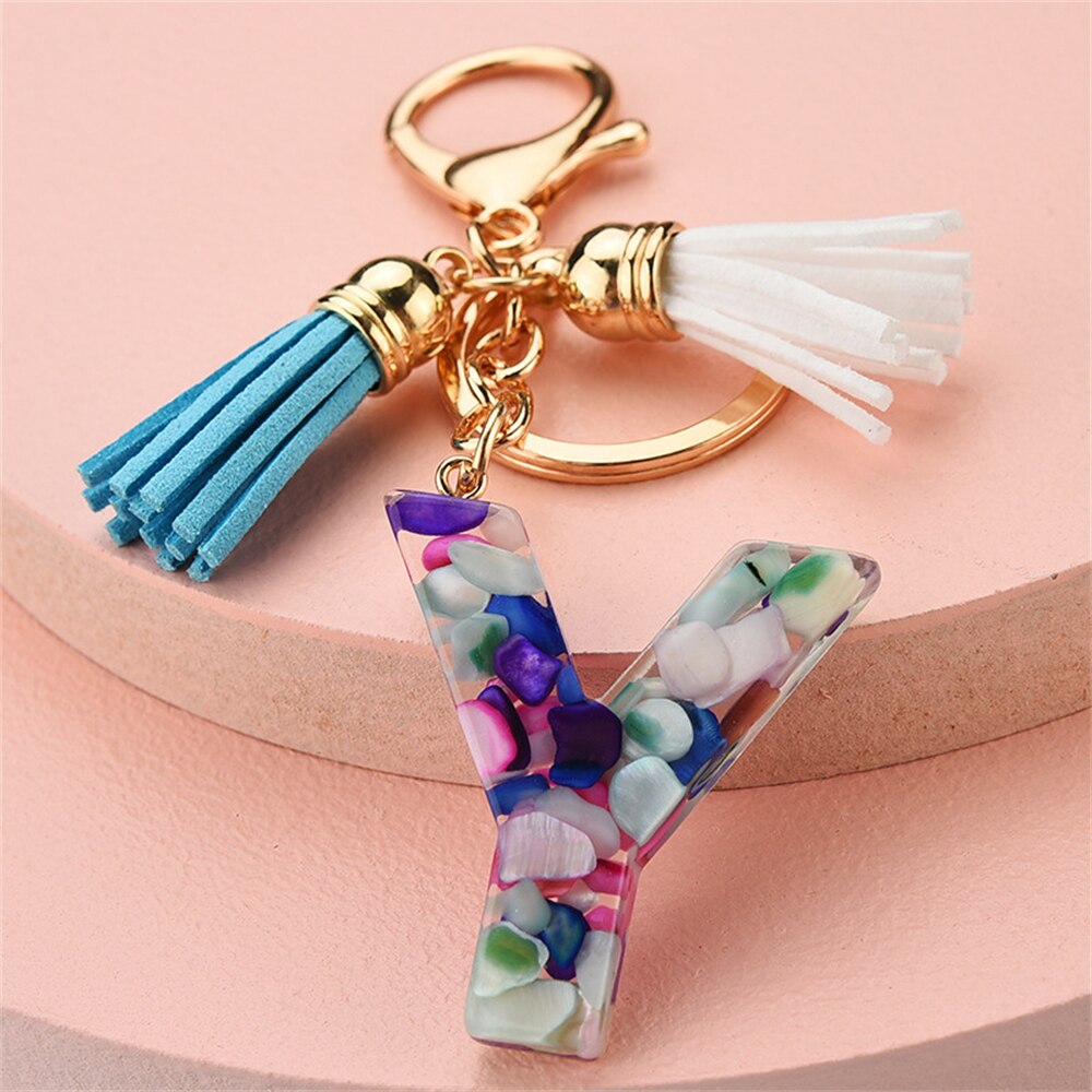 1PC Women Keychains 26 Glitter Hollowed-out Words Handbag Tassel English Letter Keyring with Puffer Ball Charms Free Shipping