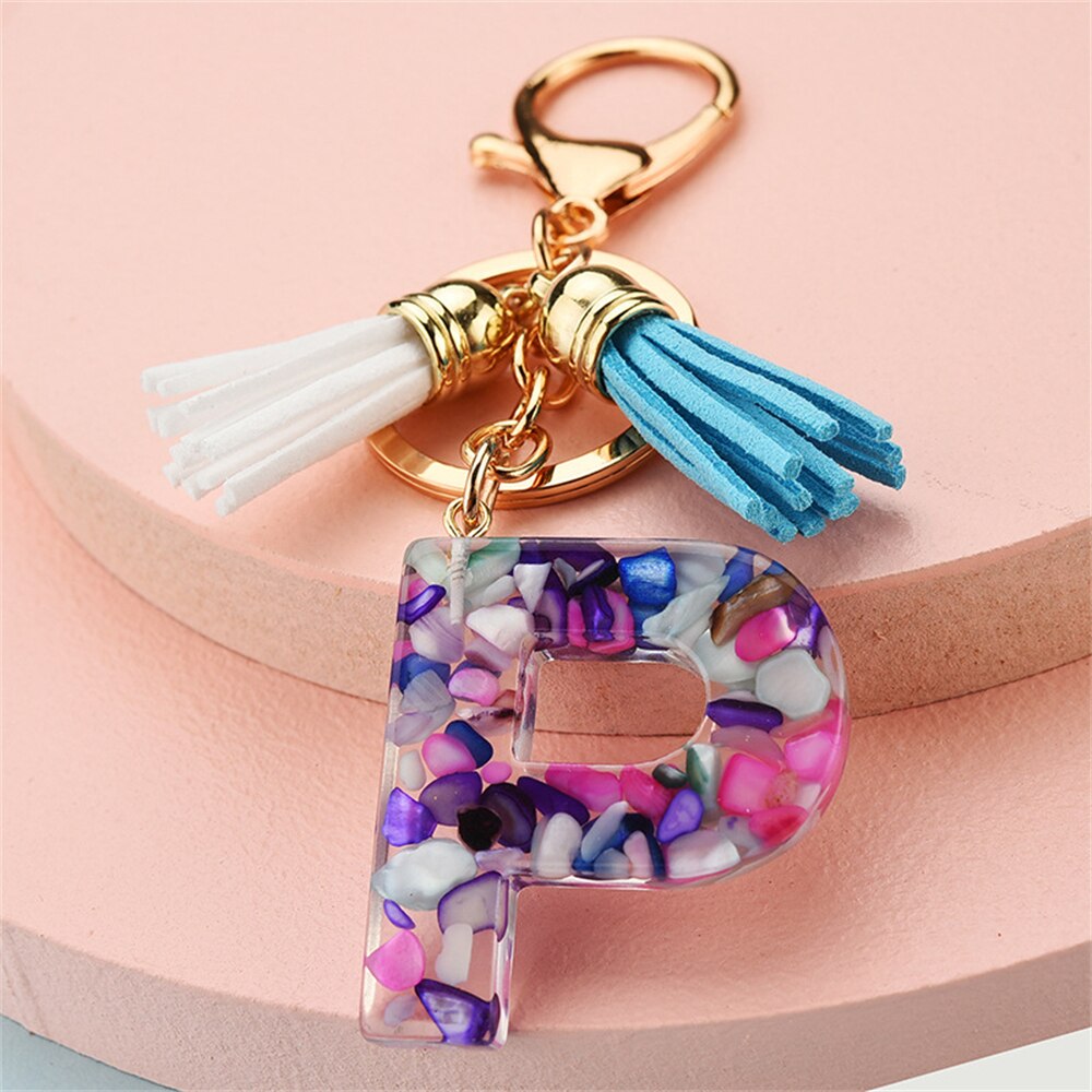 1PC Women Keychains 26 Glitter Hollowed-out Words Handbag Tassel English Letter Keyring with Puffer Ball Charms Free Shipping