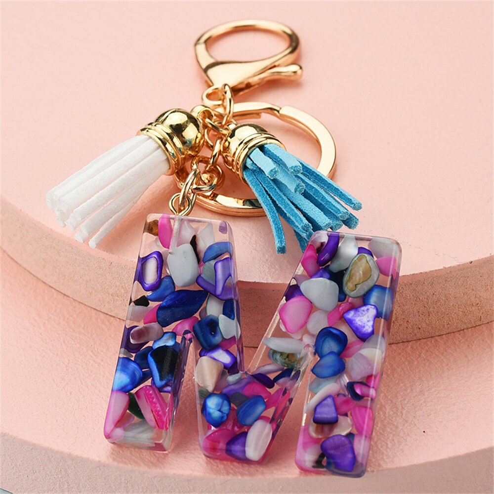 1PC Women Keychains 26 Glitter Hollowed-out Words Handbag Tassel English Letter Keyring with Puffer Ball Charms Free Shipping