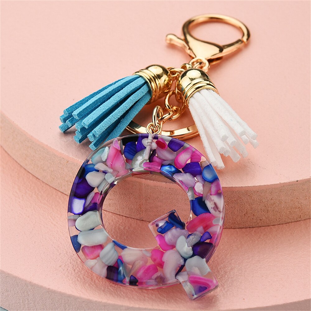 1PC Women Keychains 26 Glitter Hollowed-out Words Handbag Tassel English Letter Keyring with Puffer Ball Charms Free Shipping