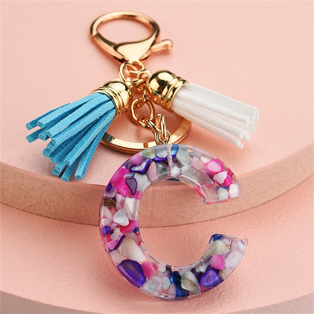 1PC Women Keychains 26 Glitter Hollowed-out Words Handbag Tassel English Letter Keyring with Puffer Ball Charms Free Shipping