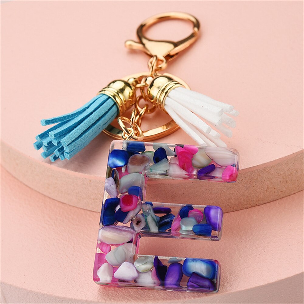 1PC Women Keychains 26 Glitter Hollowed-out Words Handbag Tassel English Letter Keyring with Puffer Ball Charms Free Shipping