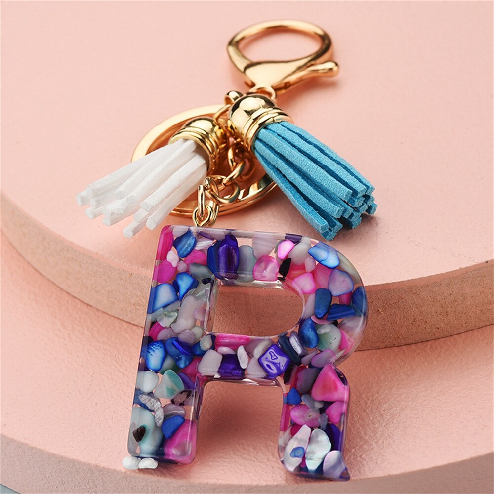 1PC Women Keychains 26 Glitter Hollowed-out Words Handbag Tassel English Letter Keyring with Puffer Ball Charms Free Shipping