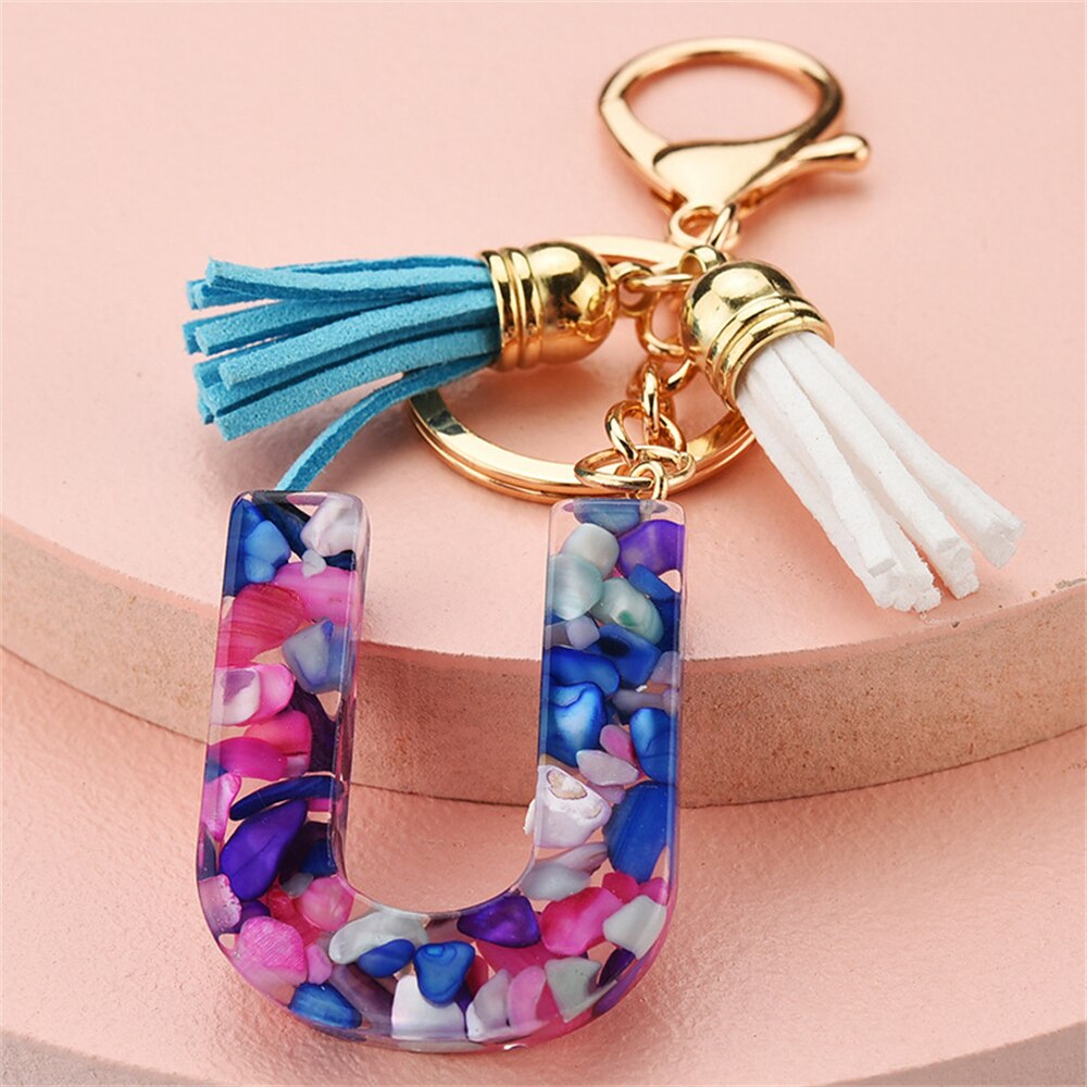 1PC Women Keychains 26 Glitter Hollowed-out Words Handbag Tassel English Letter Keyring with Puffer Ball Charms Free Shipping