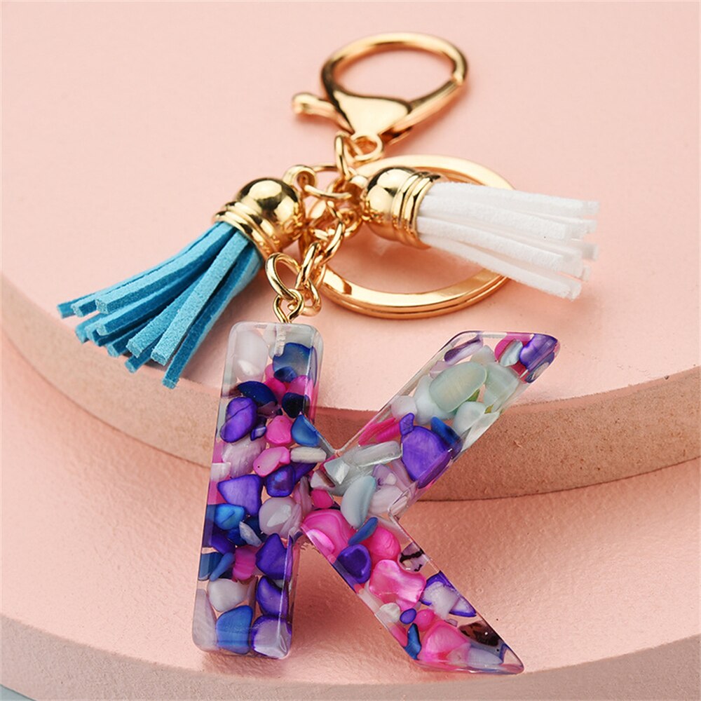 1PC Women Keychains 26 Glitter Hollowed-out Words Handbag Tassel English Letter Keyring with Puffer Ball Charms Free Shipping