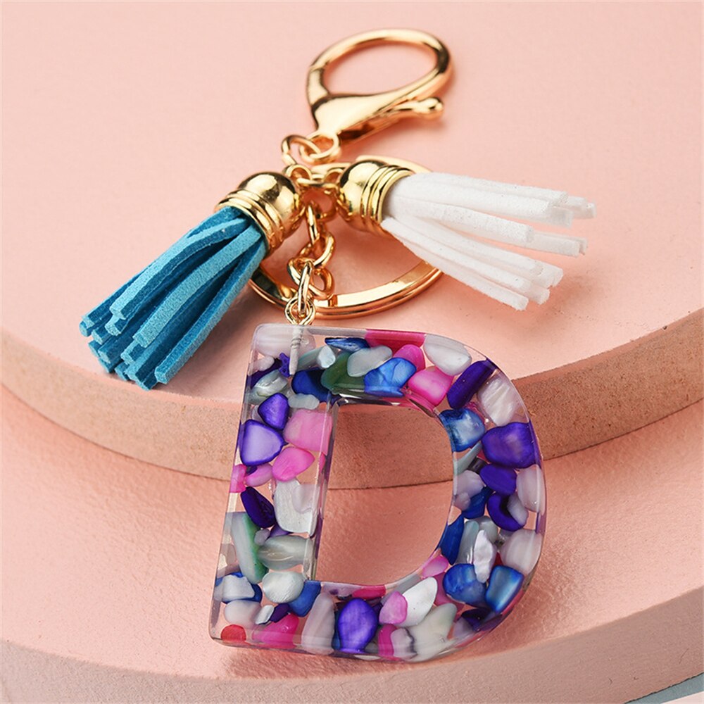1PC Women Keychains 26 Glitter Hollowed-out Words Handbag Tassel English Letter Keyring with Puffer Ball Charms Free Shipping