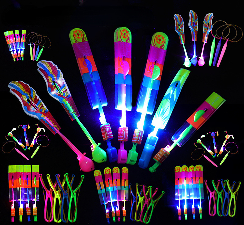 100Pcs/lot or 50pcs Amazing Light Toy Arrow Rocket Helicopter Flying Toy LED Light Toys Party Fun Gift Rubber Band Catapult